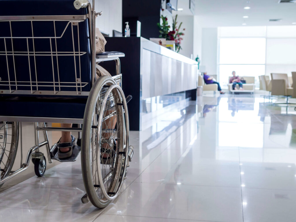 Closeup of elderly man on wheelchair in hospital